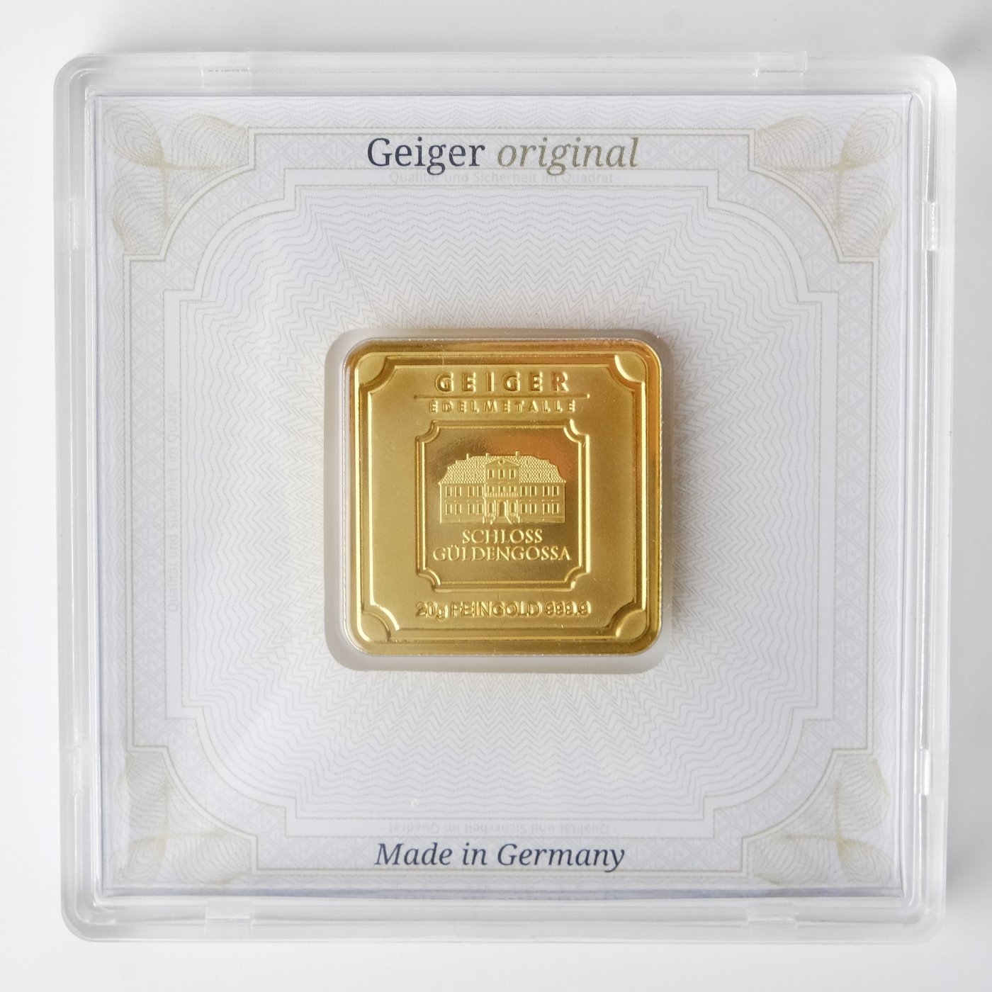 .. - Zlatý ražený ingot, zámek Guldengossa od švýcarské společnosti Geiger, zlato 999,9/1000, hrubá hmotnost 20g.