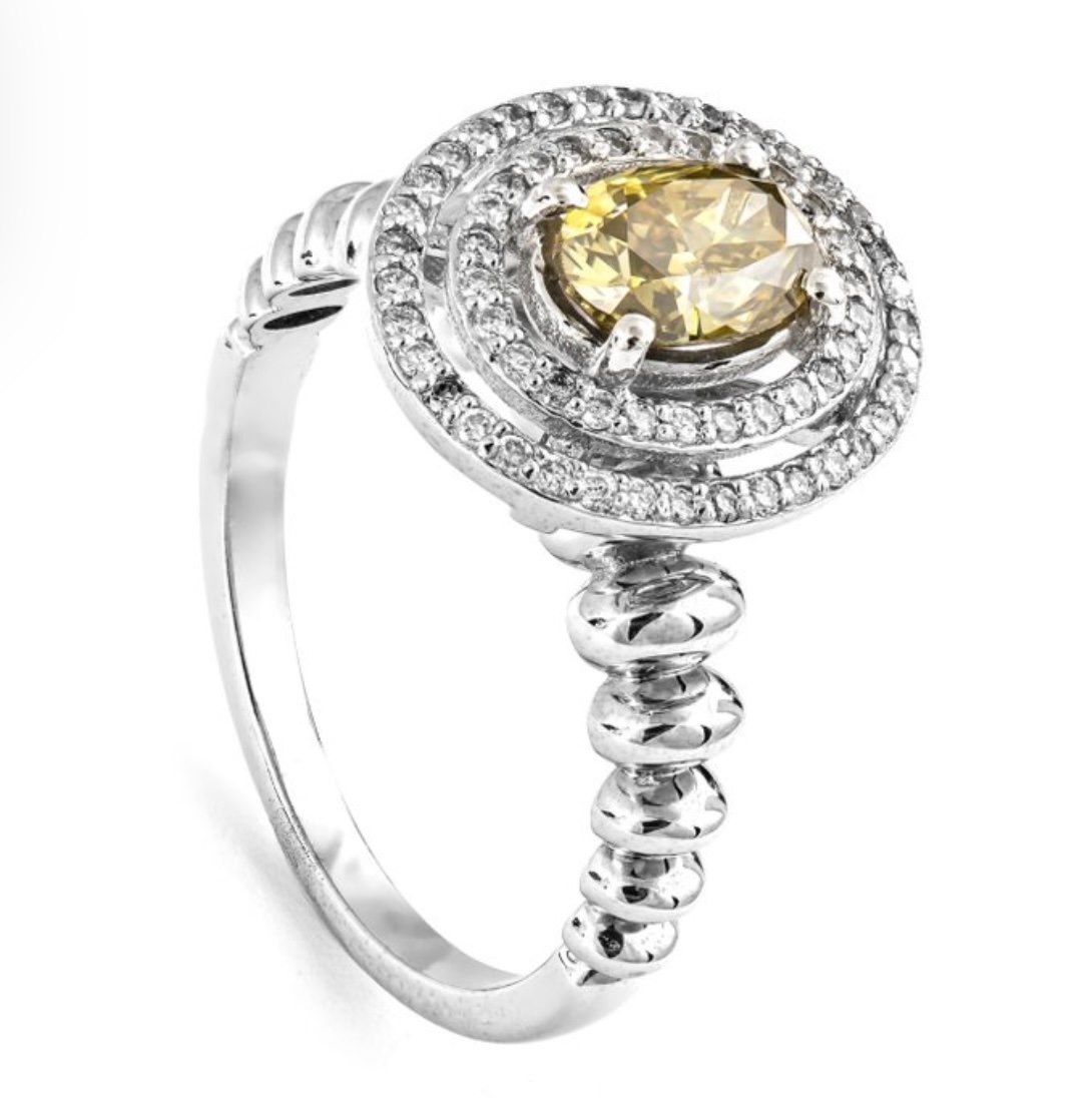 .. - Prsten s centrálním diamantem 1,01 ct a diamanty 0,26 ct, zlato 585/1000,značeno platnou puncovní značkou "labuť", hrubá hmotnost 4,45 g
