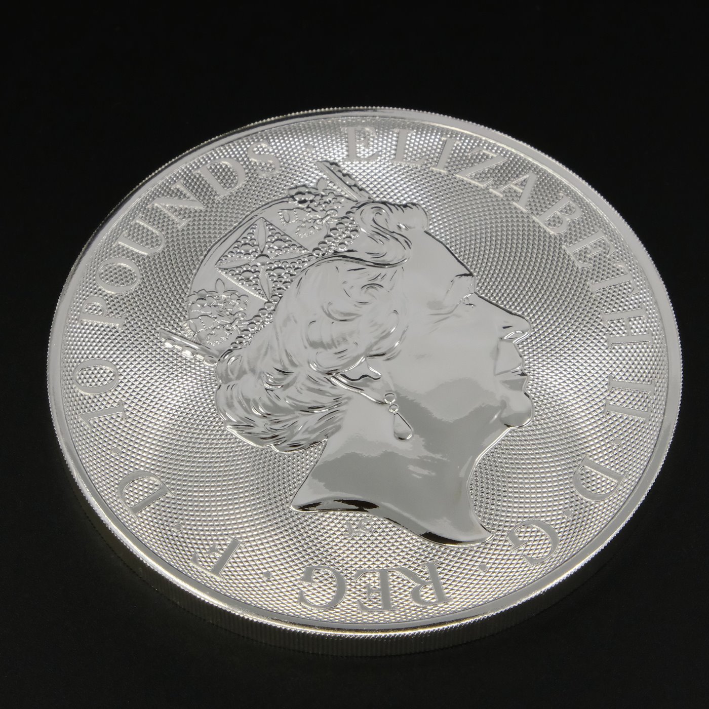 Mince - Stříbrná 10 uncová Velká Británie Alžběta II. Sokol, stříbro 999/1000, hrubá hmotnost 311g