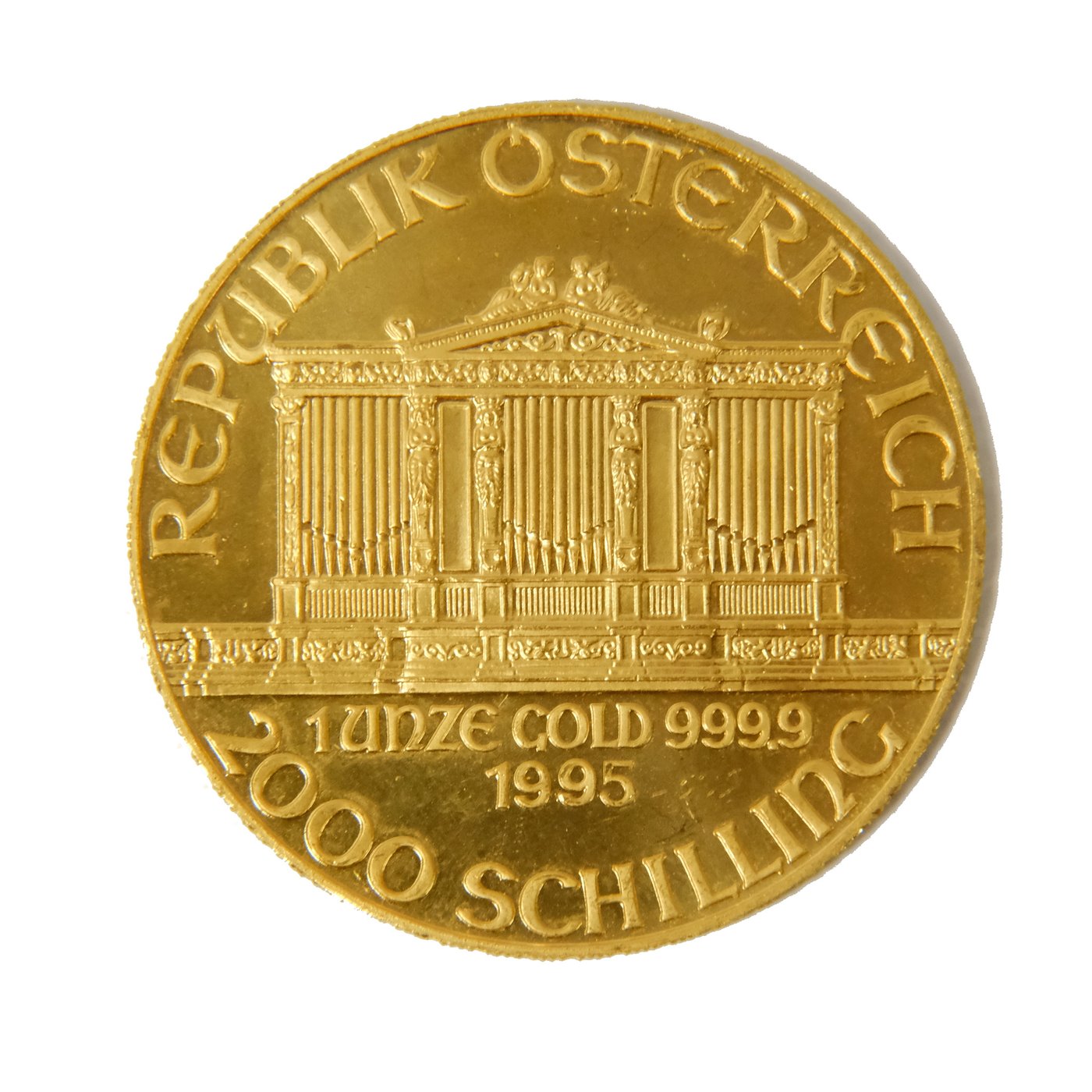 Mince - Zlatá 1 Uncová mince 2000 Schilling Philharmoniker 1995 Rakousko. Zlato 999,9/1000, hmotnost hrubá 31,15g