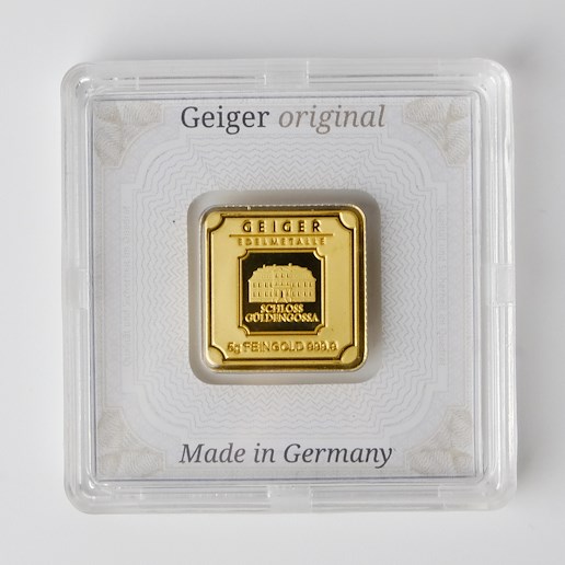 .. - Zlatý ražený ingot, zámek Guldengossa od švýcarské společnosti Geiger, zlato 999,9, hrubá hmotnost 5g.