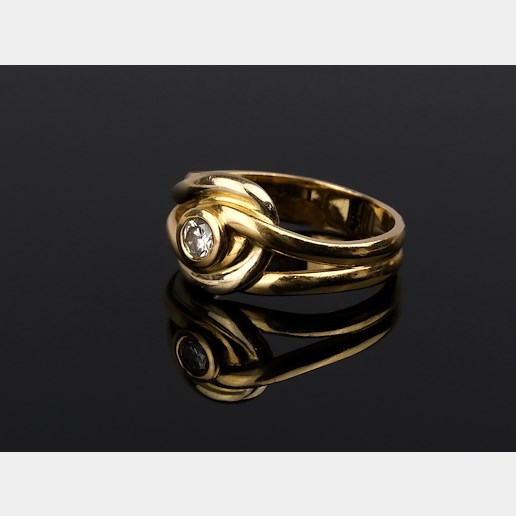 .. - Prsten, zlato 750/1000, briliant 0,10ct,značeno platnou puncovní značkou "kohout", hrubá hmotnost 5,60 g 