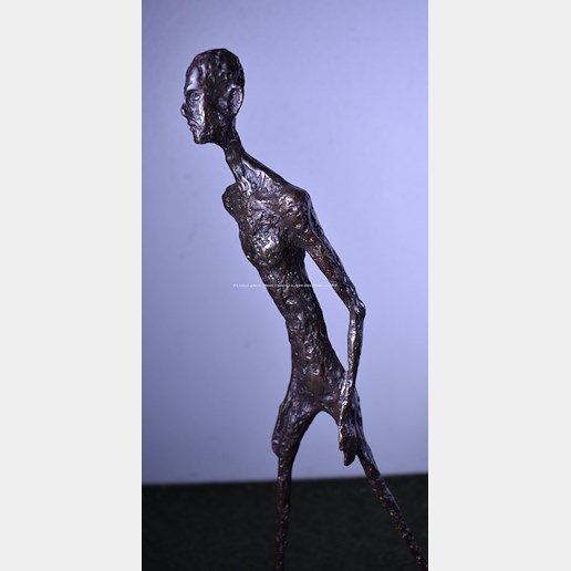 Alberto Giacometti - Kráčející muž